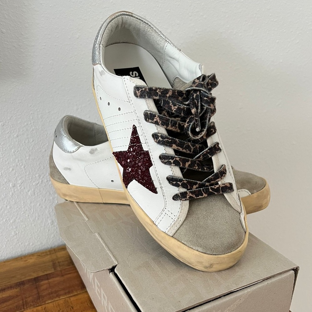 Like new Golden Goose Super-Star with burgundy glitter star and silver heel tab